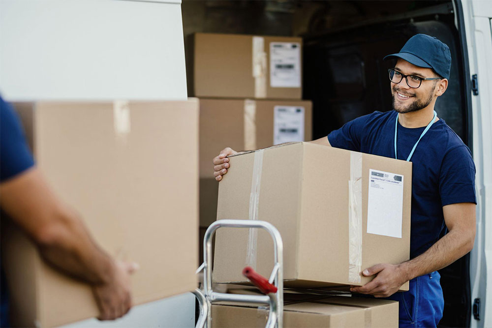 Movers carrying boxes during a move in Cranston, Calgary