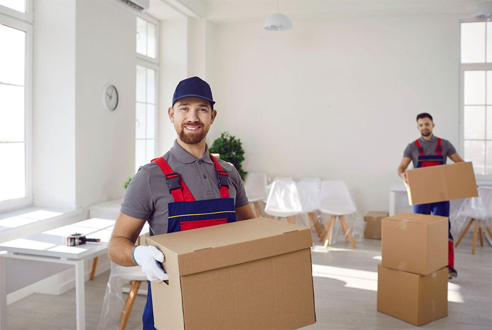 Movers carrying boxes during a move in Evergreen, Calgary