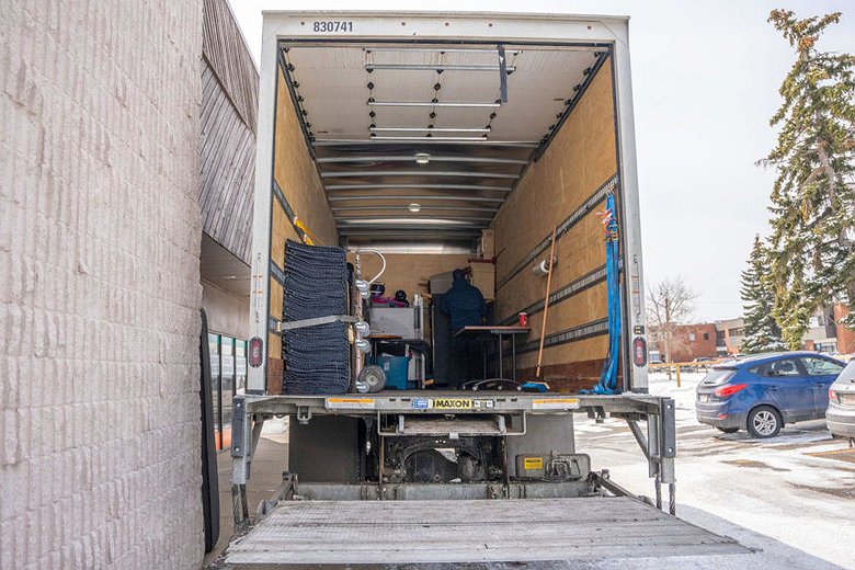 Moving truck being loaded during a moving day in Calgary