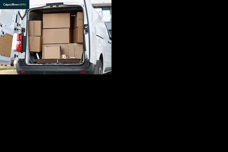 Open van loaded with cardboard boxes, ready for a moving day in Calgary, showcasing an organized and efficient relocation process