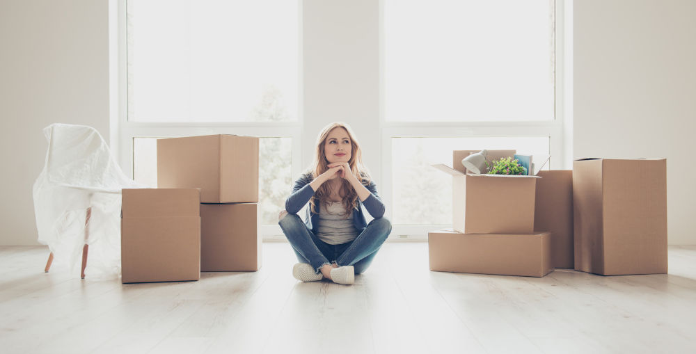 Smiling young woman portrait celebrating a successful move